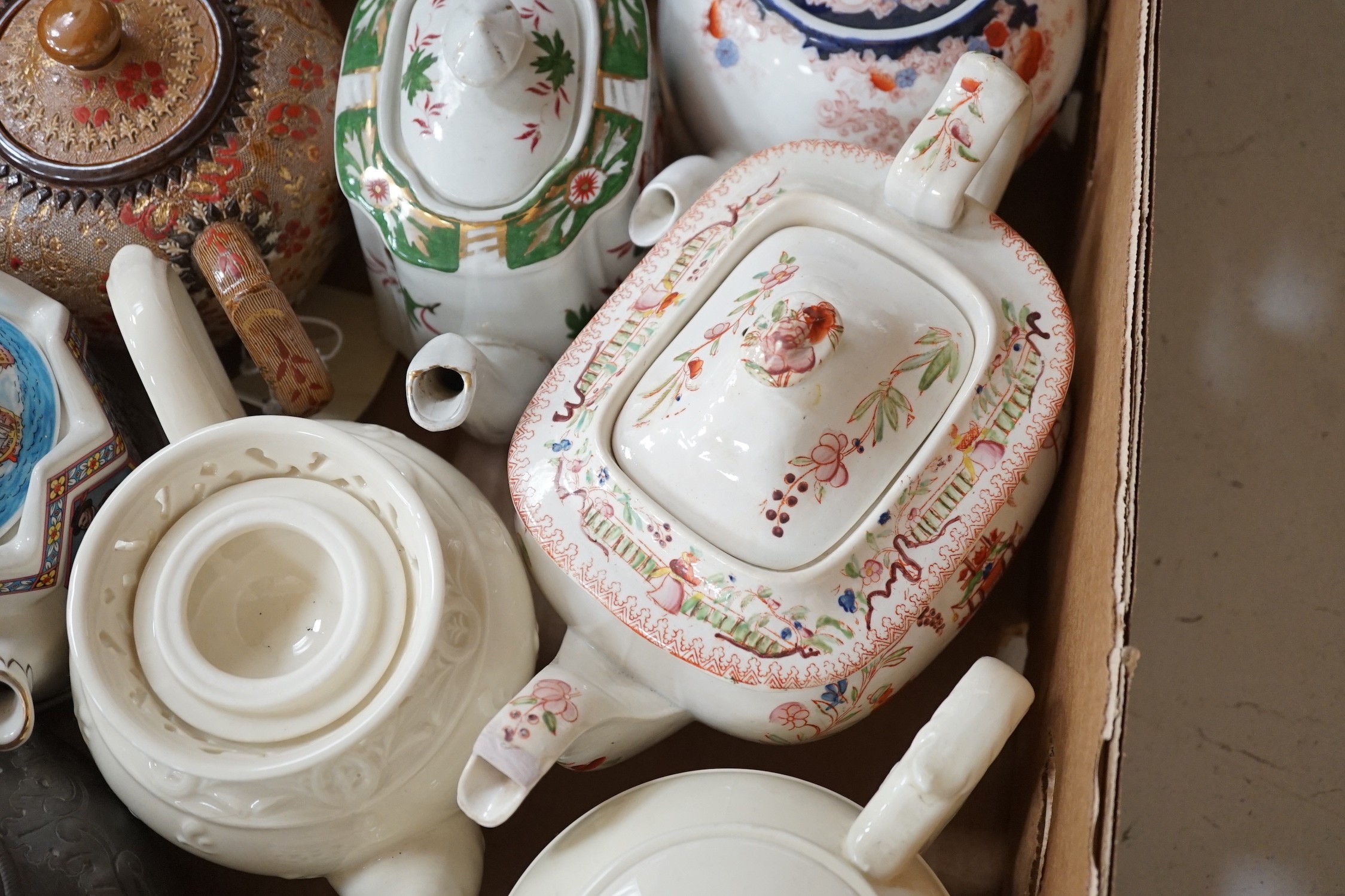 A quantity of various teapots including Doulton, Sadler etc.